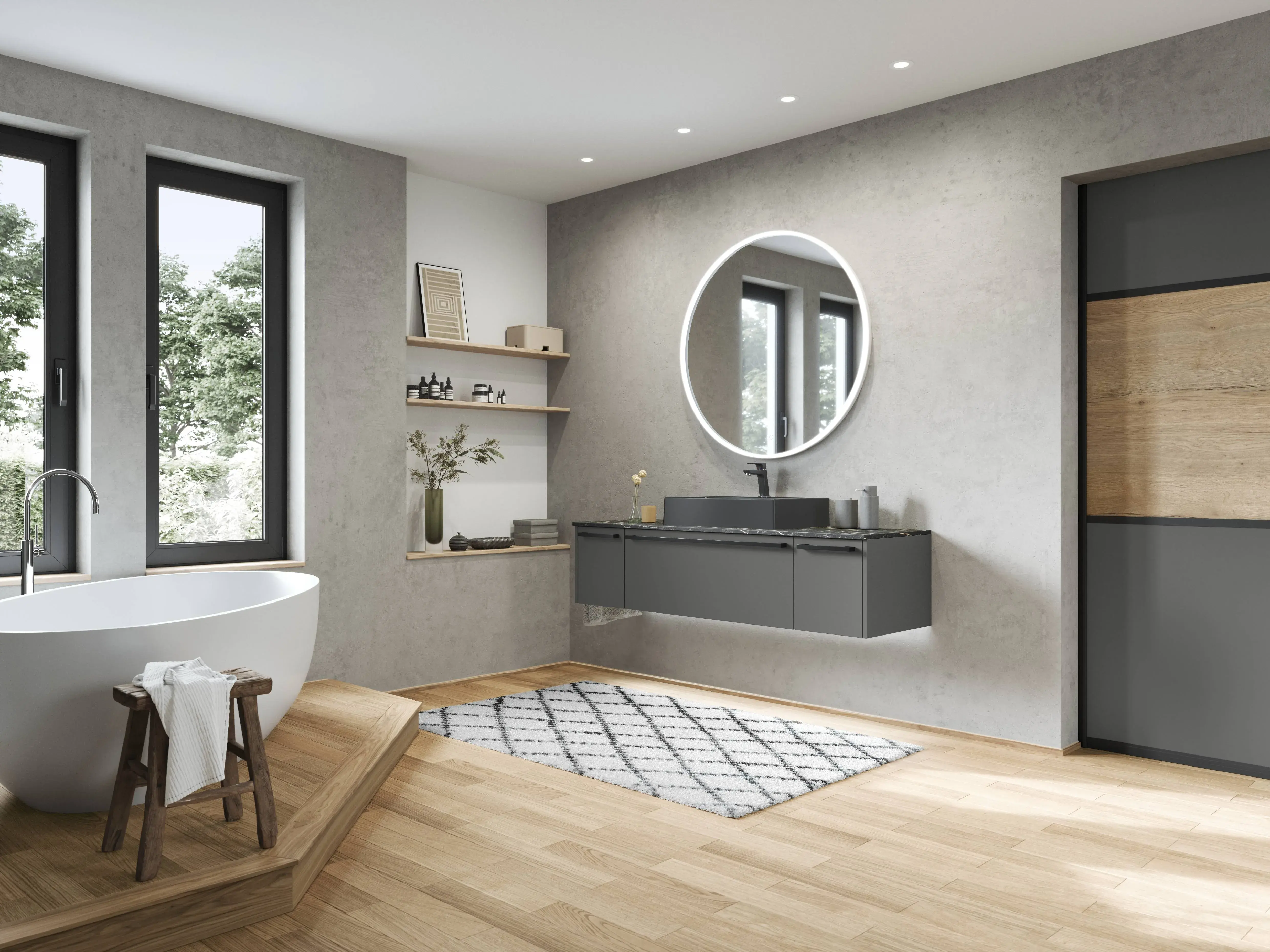 Modernes Badezimmer mit grauem Waschtisch, schwarzem Aufsatzwaschbecken, rundem LED-Spiegel und freistehender Badewanne