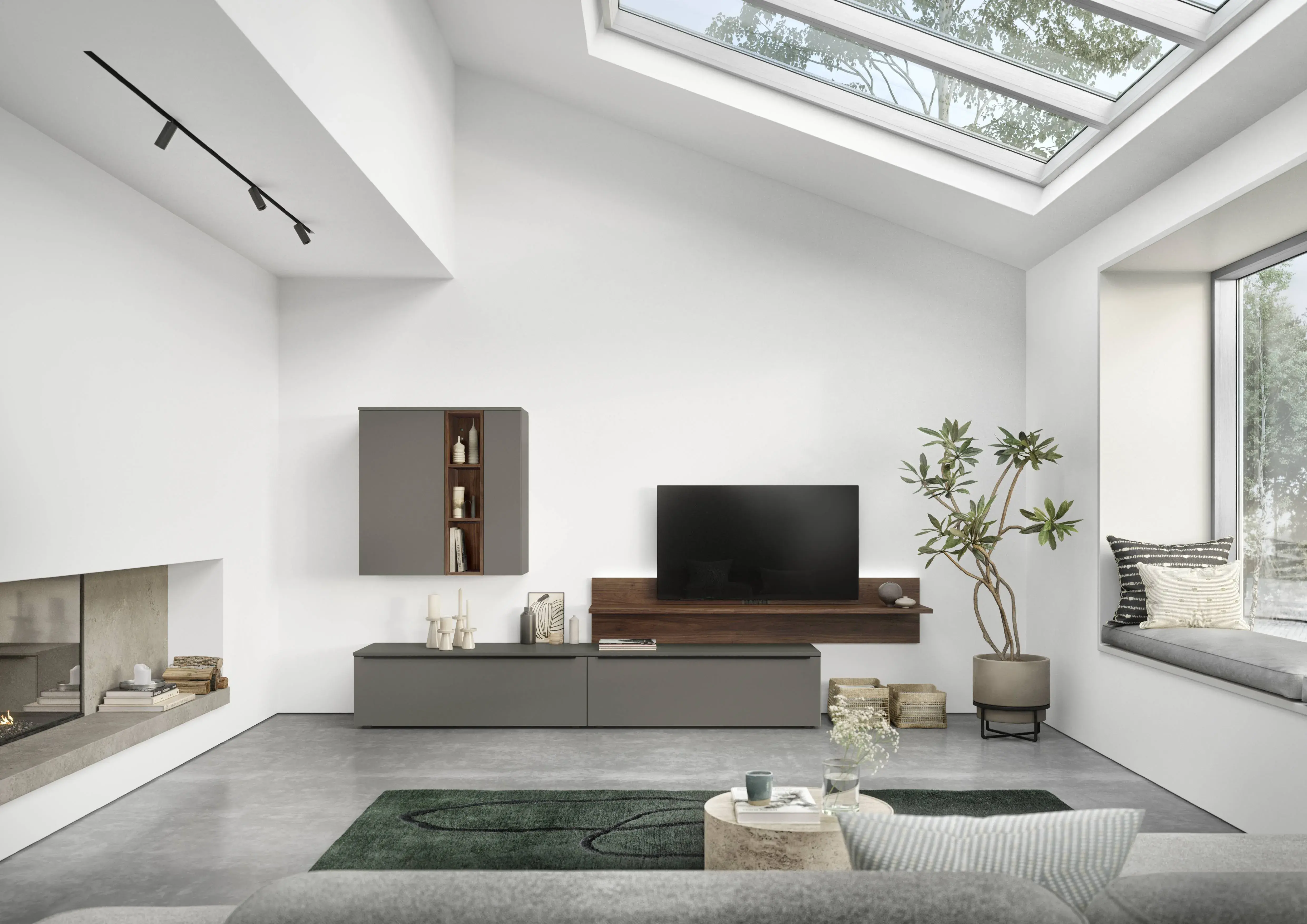 Helles modernes Wohnzimmer mit TV-Wohnwand in Grau und dunkler Holzoptik, Kamin, Dachfenster und integriertem Sitzfenster