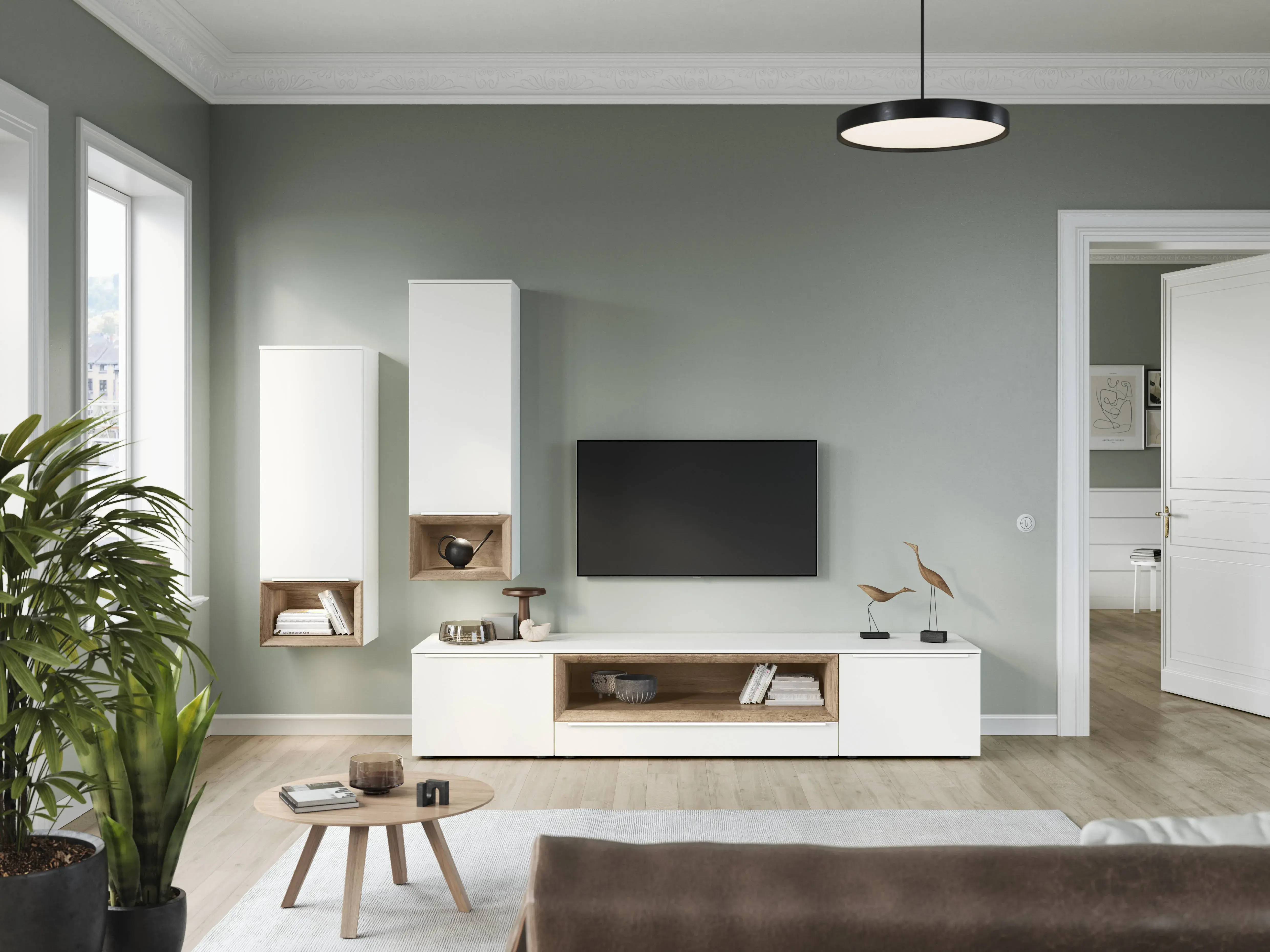 Modernes Wohnzimmer mit weißer TV-Wohnwand, offenen Regalfächern in Holzoptik und hellgrüner Wandgestaltung